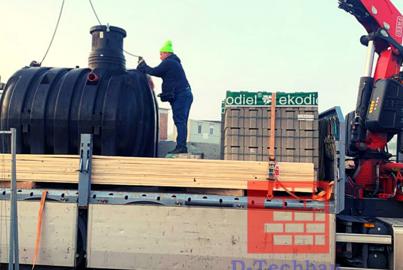 Stavba domu v Rakúsku - RD Davi21 Neudorf bei Parndorf - Vykládka retenčnej nádrže na dažďovú vodu Stavba domu v Rakúsku - RD Davi21 Neudorf bei Parndorf - Vykládka retenčnej nádrže na dažďovú vodu